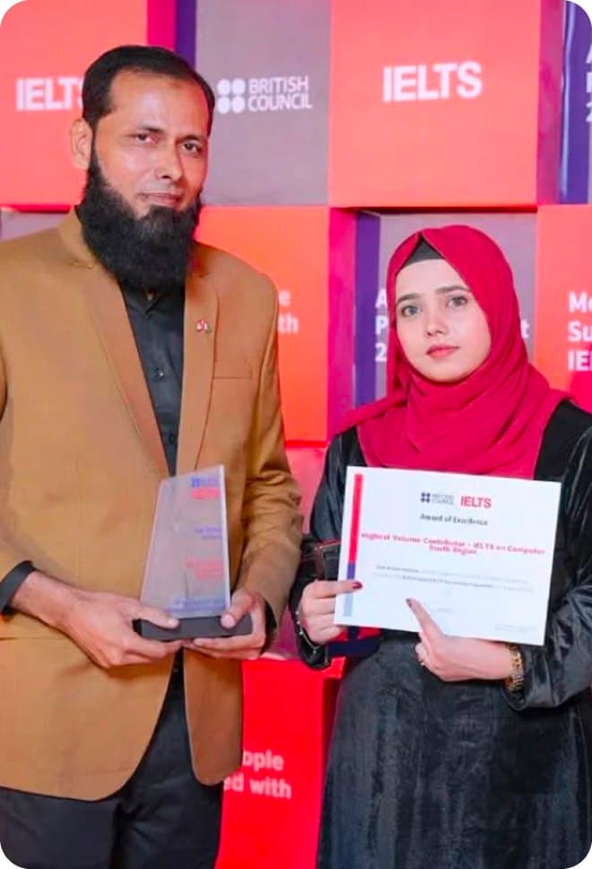 A student receiving an IELTS award in front of a British Council backdrop